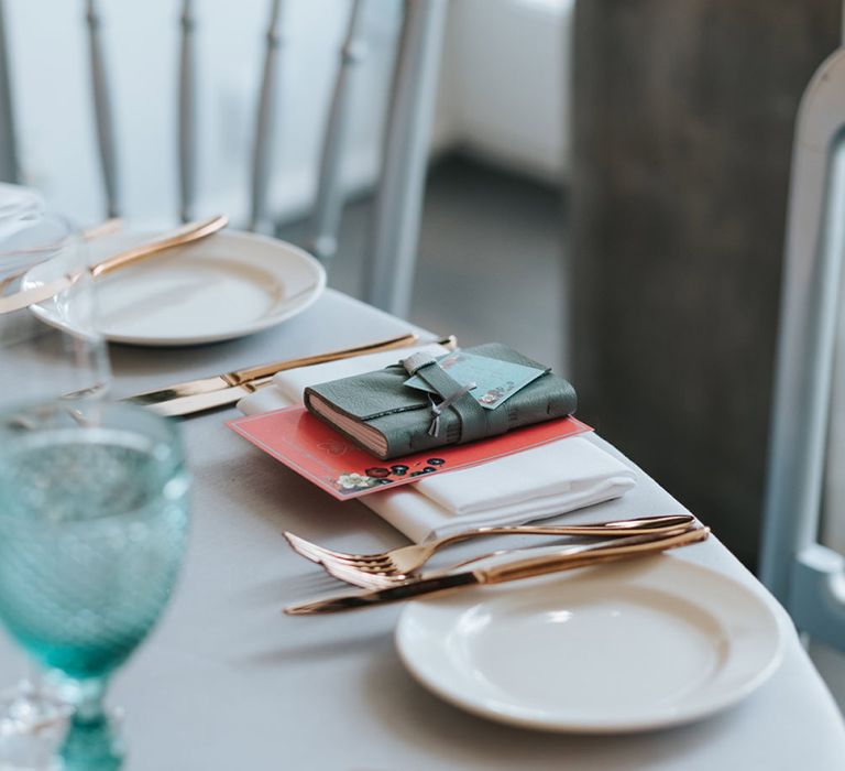 Blue Wine Glass | Copper Cutlery | Leather Book Wedding Favour | Personalised Pink Wedding Breakfast Menu | Duck Egg Blue Thank You Tag | Meringue Kisses &amp; Colourful Wedding Flowers &amp; Stationery for a London Wedding at The Globe | Miss Gen