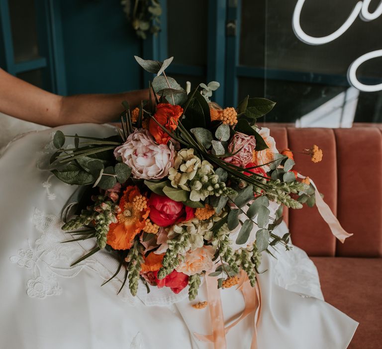 Bright Bridal Bouquet with Foliage and Living Coral Flowers