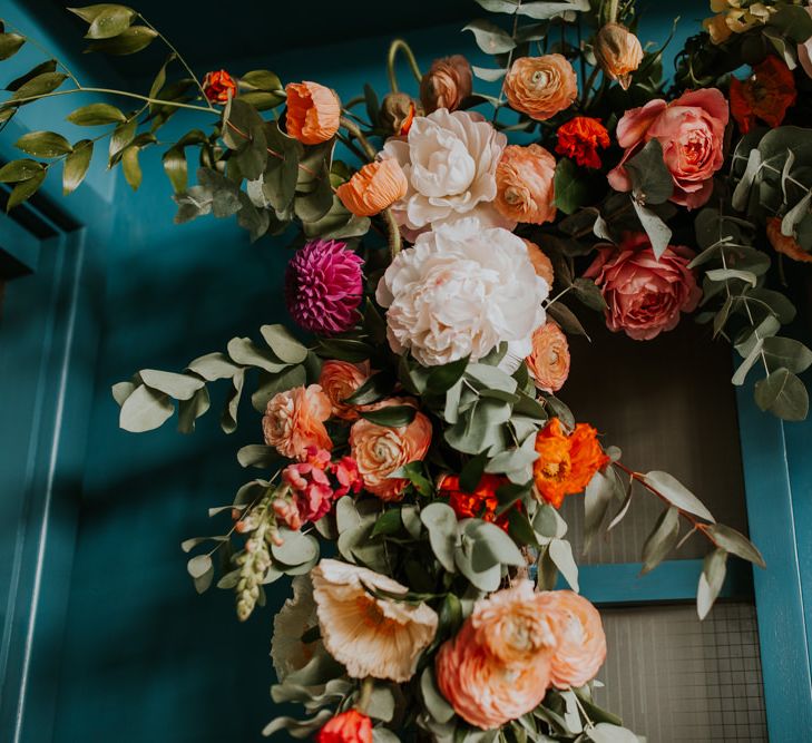 Floral Arrangement with Dahlias, Ranunculus, Peonies , Roses and Foliage