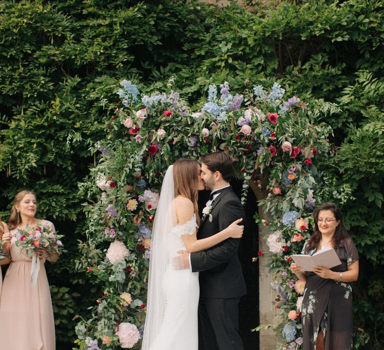 Outdoor Wedding Ceremony with Floral Arch | Bride in Lace Custom Made Pronovias Wedding Dress | Groom in Black Tie | Contemporary Elegance Wedding in the Countryside  | M &amp; J Photography | Film by Jacob and Pauline