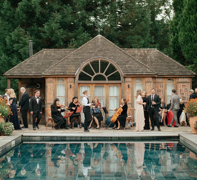 Pool Side String Quartet Drinks Reception | Contemporary Elegance Wedding in the Countryside  | M &amp; J Photography | Film by Jacob and Pauline