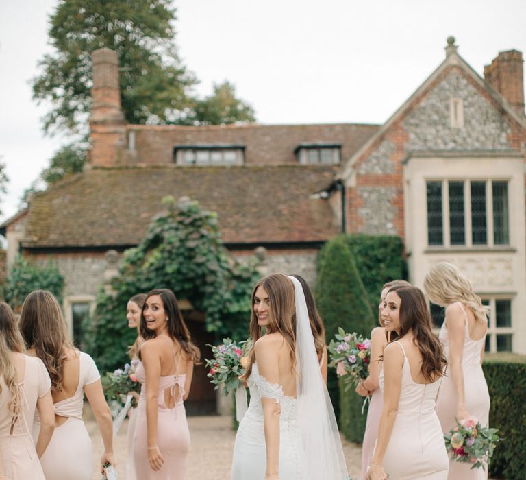 Bridal Party | Bride in Pronovias Wedding Dress | Bridesmaids in Peach Revolve Dresses | Contemporary Elegance Wedding in the Countryside  | M &amp; J Photography | Film by Jacob and Pauline