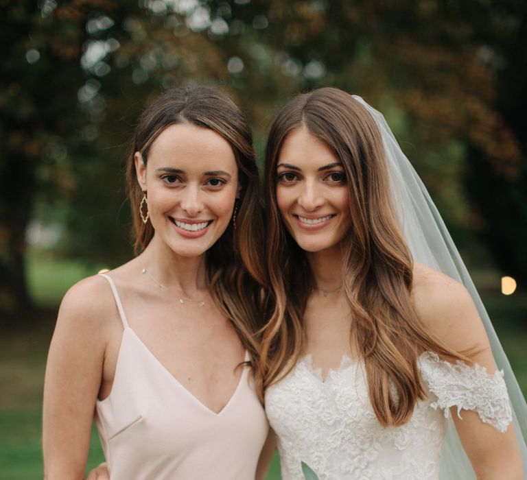 Bride in Pronovias Wedding Dress | Bridesmaid in Peach Revolve Dress | Groomsmen in Black Tie Suit | Contemporary Elegance Wedding in the Countryside  | M &amp; J Photography | Film by Jacob and Pauline