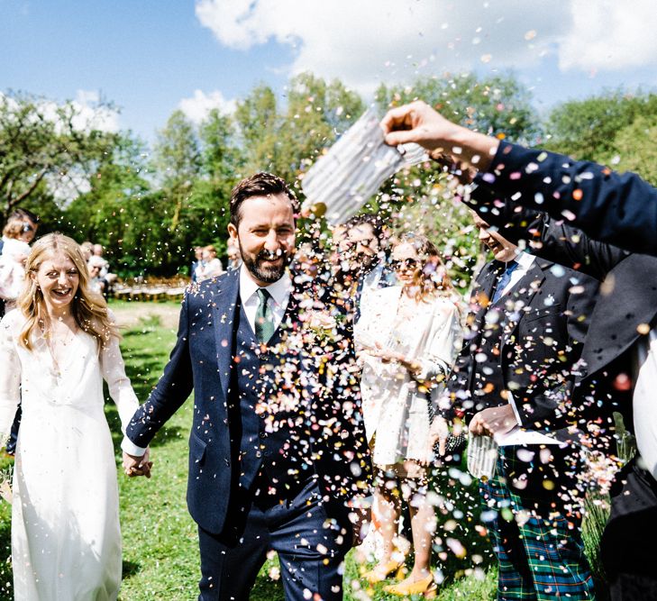 Confetti Moment with Bride in Andrea Hawkes Wedding Dress