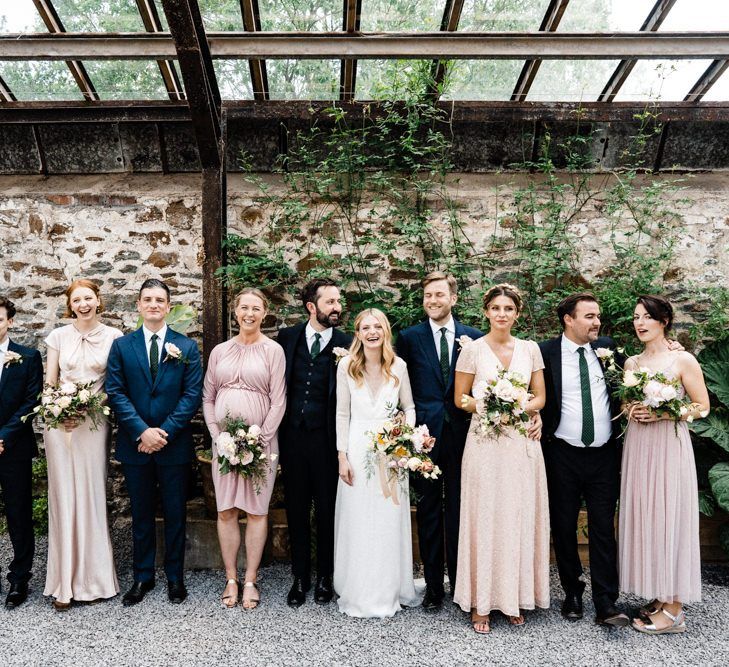 Wedding Party Portrait with Bridesmaids in Different Pink Dresses