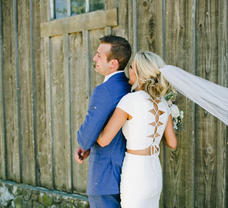 Bride and Groom First Look with Bride in Noel and Jean Bridal Separates Approaching Her Groom