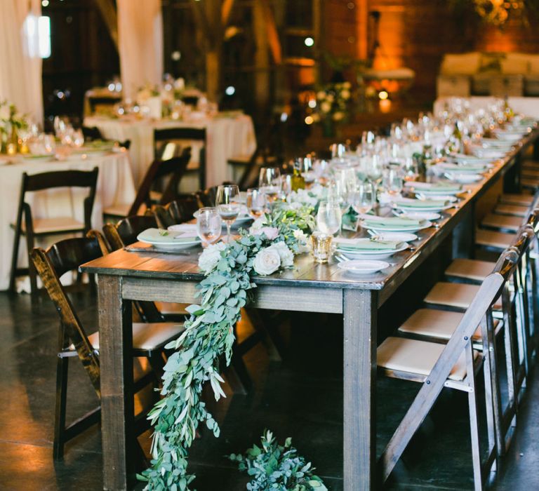 Ranch Wedding Reception with Drape Decor and Greenery Table Runner