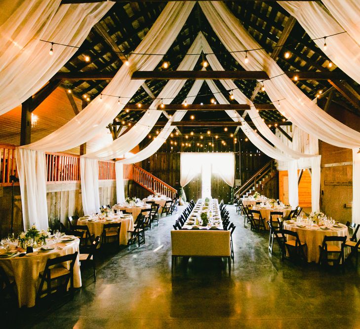 Ranch Wedding Reception  with Drapes and Fairy lights Decor