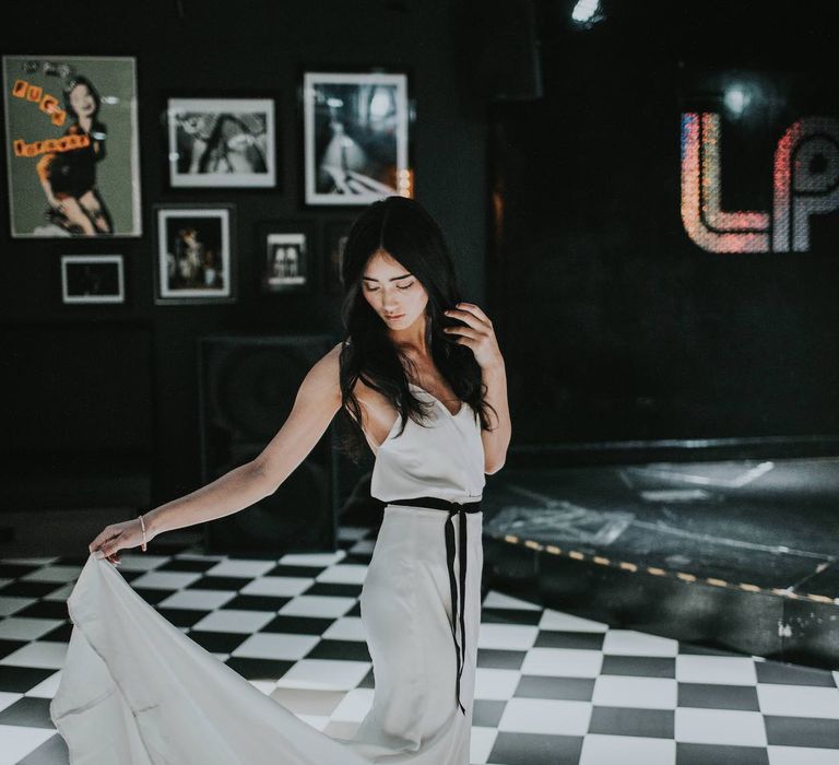 Bride in Slinky Marquis Bridal Gown | Minimalist Monochrome Inspiration with Anemone's &amp; White Genista Flowers styled by The Bijou Bride | Igor Demba Photography | Gione da Silva  Film