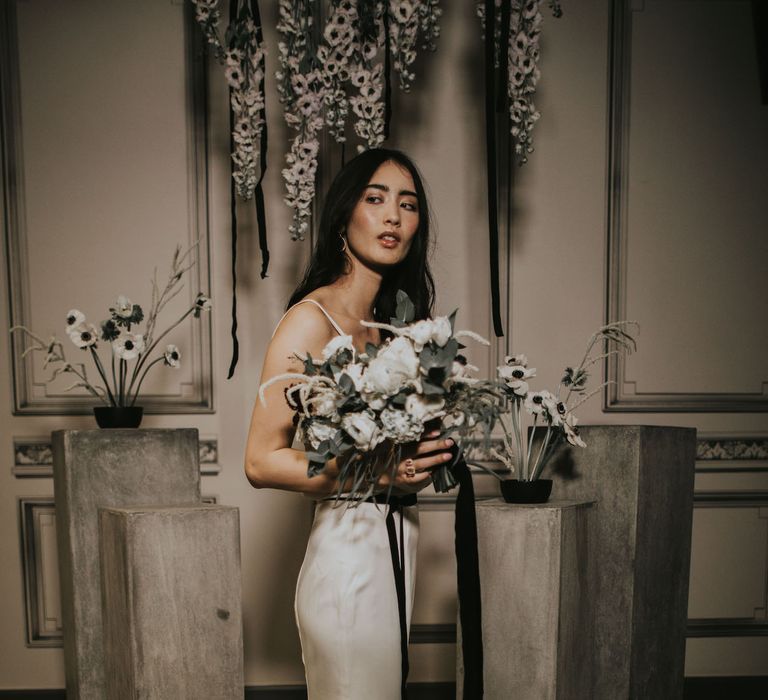 Bride in Slinky Marquis Bridal Gown | Anemone's &amp; White Genista Bouquet | Minimalist Monochrome Inspiration with Anemone's &amp; White Genista Flowers styled by The Bijou Bride | Igor Demba Photography | Gione da Silva  Film