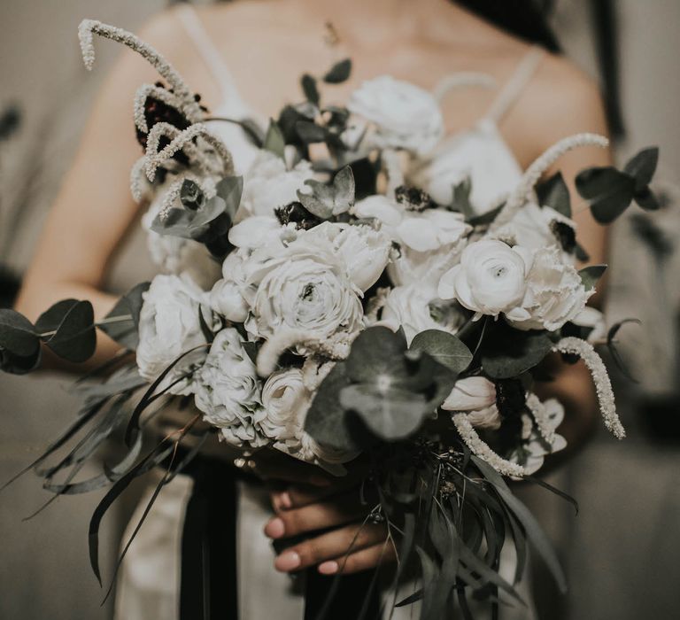 Anemone &amp; Ranunculus Bridal Bouquet | Minimalist Monochrome Inspiration with Anemone's &amp; White Genista Flowers styled by The Bijou Bride | Igor Demba Photography | Gione da Silva  Film