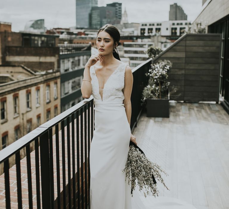 Bride in Fitted Marquis Bridal Gown with White Genista Bouquet | Minimalist Monochrome Inspiration with Anemone's &amp; White Genista Flowers styled by The Bijou Bride | Igor Demba Photography | Gione da Silva  Film