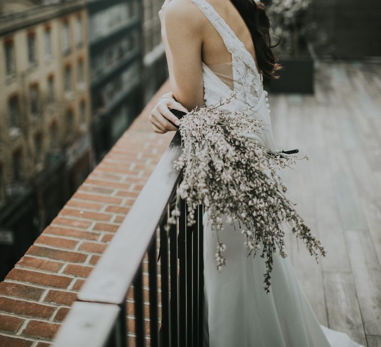 Bride in Fitted Marquis Bridal Gown with White Genista Bouquet | Minimalist Monochrome Inspiration with Anemone's &amp; White Genista Flowers styled by The Bijou Bride | Igor Demba Photography | Gione da Silva  Film