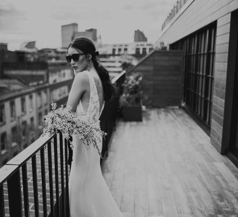 Bride in Fitted Marquis Bridal Gown with White Genista Bouquet | Minimalist Monochrome Inspiration with Anemone's &amp; White Genista Flowers styled by The Bijou Bride | Igor Demba Photography | Gione da Silva  Film