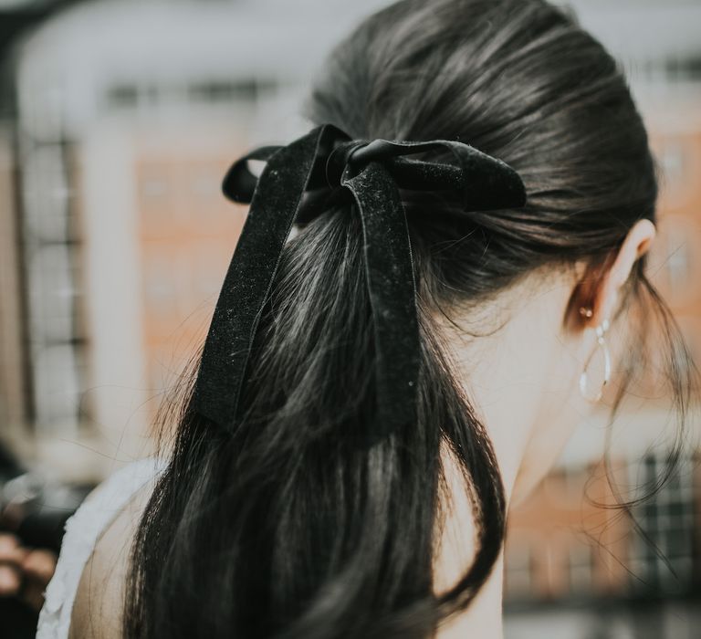 Bridal Ponytail with Black Velvet Ribbon | Minimalist Monochrome Inspiration with Anemone's &amp; White Genista Flowers styled by The Bijou Bride | Igor Demba Photography | Gione da Silva  Film