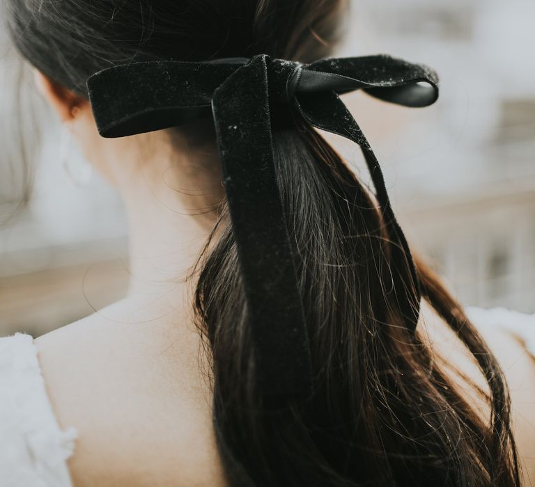 Bridal Ponytail with Black Velvet Ribbon | Minimalist Monochrome Inspiration with Anemone's &amp; White Genista Flowers styled by The Bijou Bride | Igor Demba Photography | Gione da Silva  Film