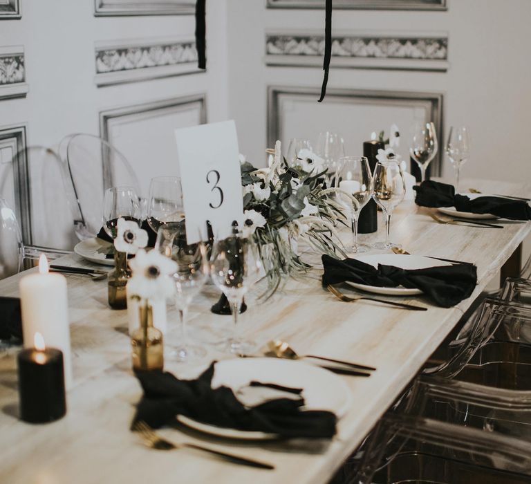 Elegant Tablescape with Ghost Chairs &amp; Hanging Anemone Floral Arrangement | Minimalist Monochrome Inspiration with Anemone's &amp; White Genista Flowers styled by The Bijou Bride | Igor Demba Photography | Gione da Silva  Film