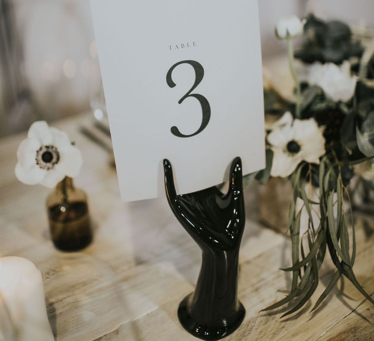 Nat's Paper Studio Table Number Stationery | Elegant Tablescape with Ghost Chairs &amp; Hanging Anemone Floral Arrangement | Minimalist Monochrome Inspiration with Anemone's &amp; White Genista Flowers styled by The Bijou Bride | Igor Demba Photography | Gione da Silva  Film