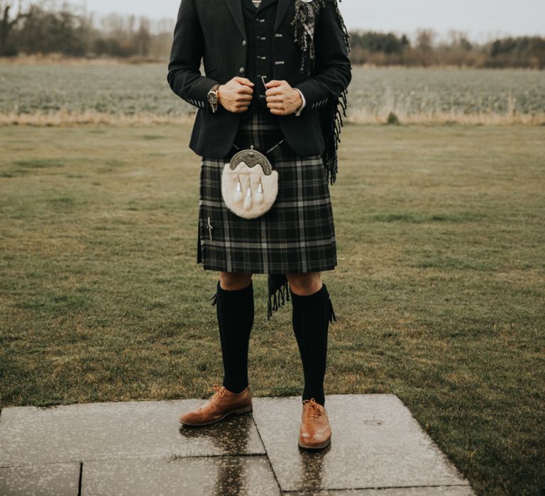 Groom in traditional kilt for Kinkell Byre wedding