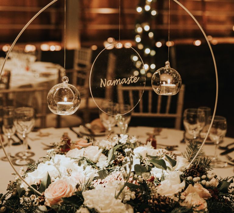 Wedding table hoop decor and hanging candles