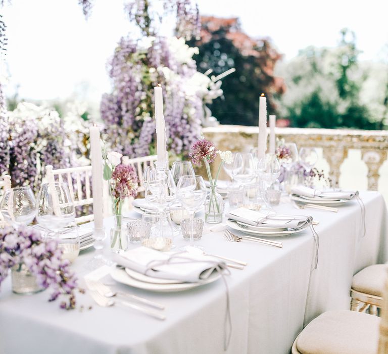 Elegant Table Scape with Taper Candles and Cut Glass