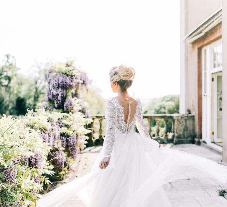 Bride in Lace Back and Tulle Skirt Wedding Dress with Pinned Bridal Bun Up do