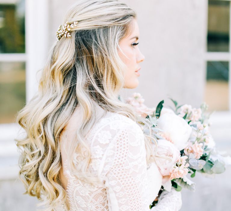 Bride in Lace Long Sleeve Wedding Dress with Half Up Half Down Wavy Hair