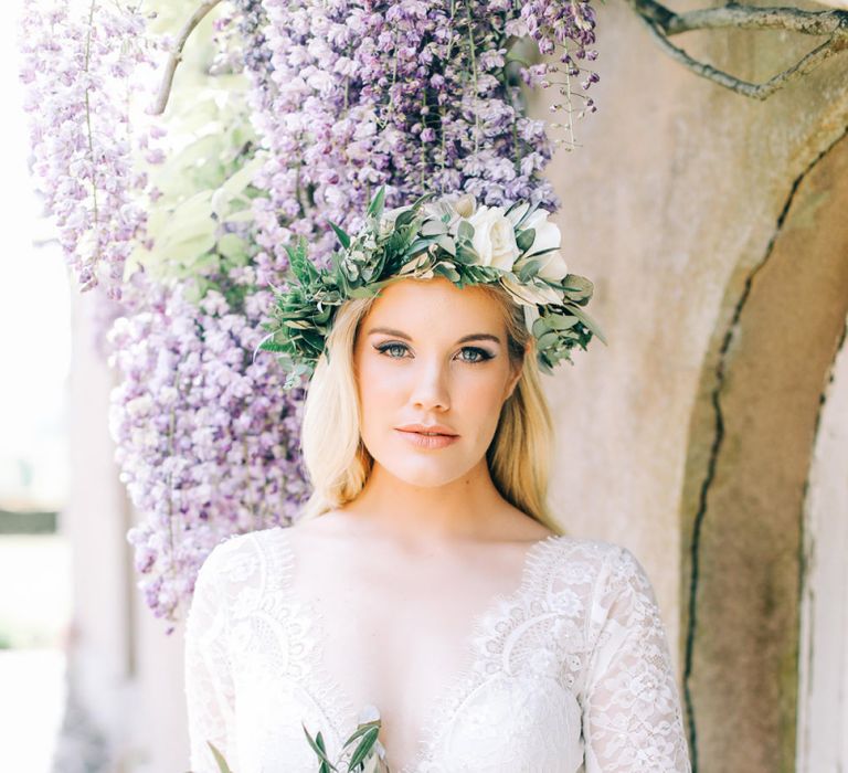 Bride in Flower Crown Holding Peach and White Wedding Bouquet