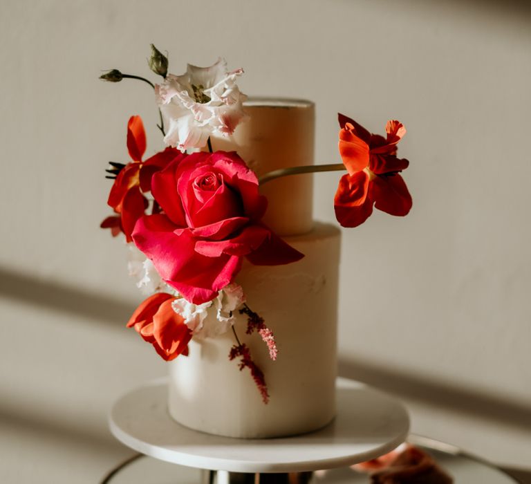 Minimalist Two Tier Wedding Dress with Red Wedding Flowers