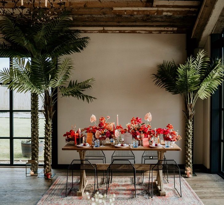 Intimate Tablescape with Pink and Red Wedding Flower Centrepieces