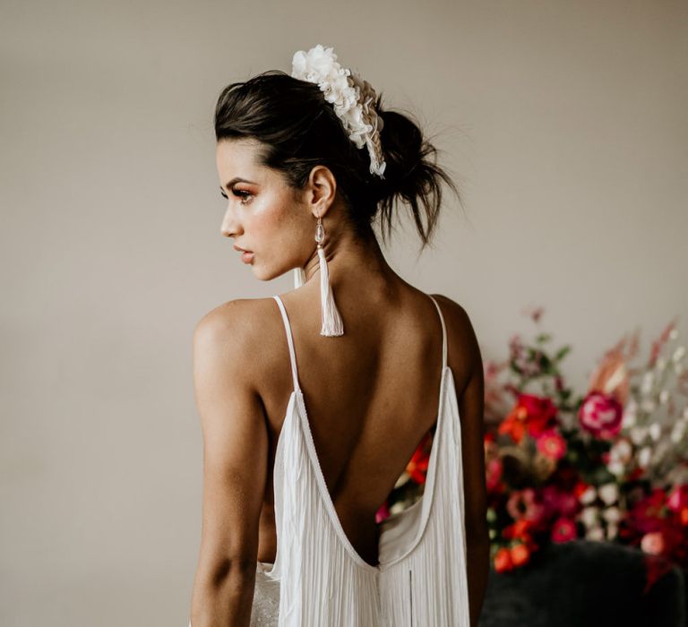 Modern Bride in a Minimalist Wedding Dress with Fringe Back Detail