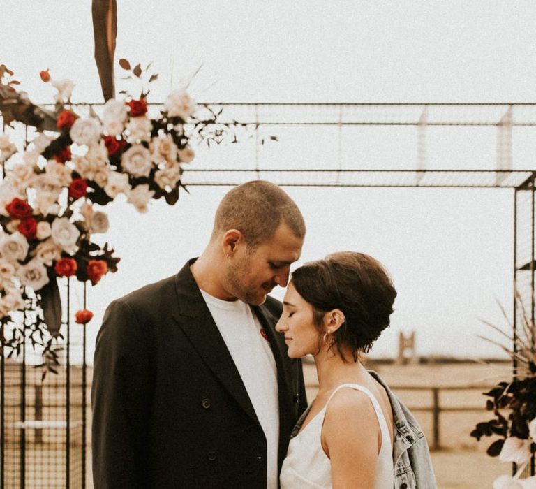 Outdoor wedding ceremony at Godwick Great Barn