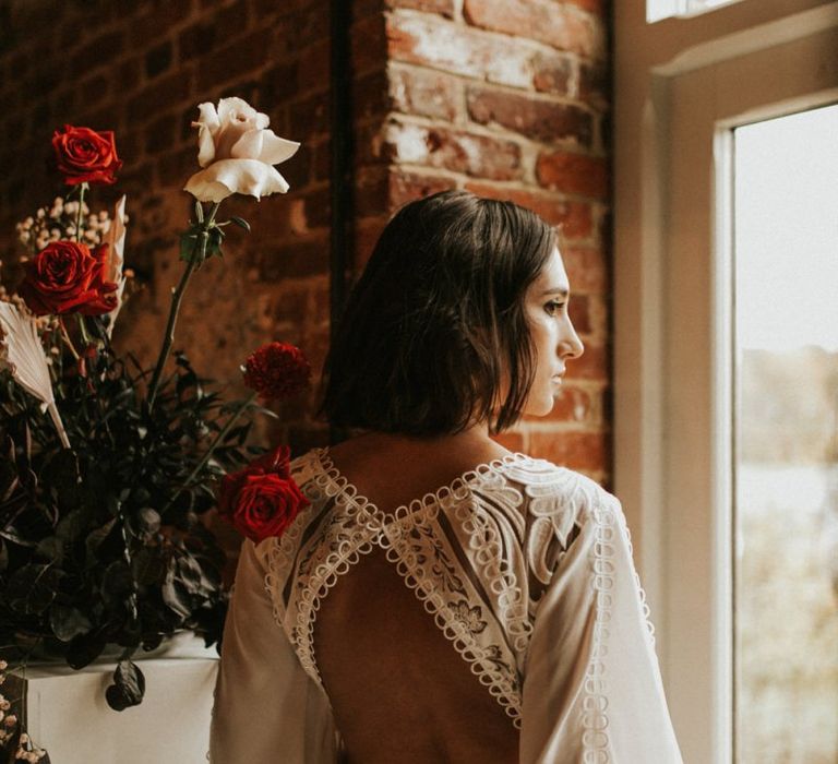 Bride in keyhole back boho wedding dress at Godwick Great Barn