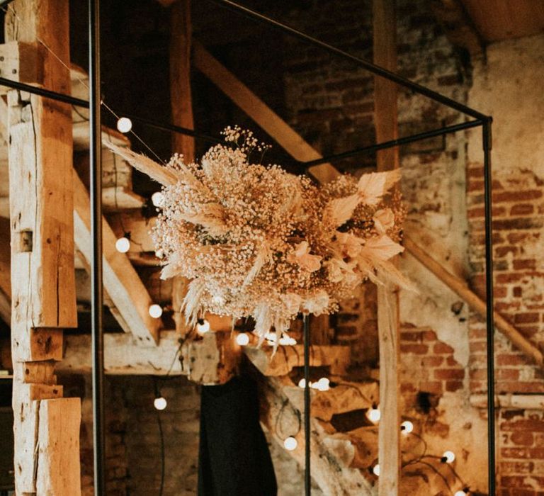 Table scape at Godwick Great Barn with dried flower installation