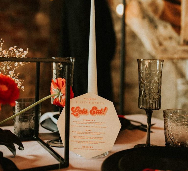 White taper candles and retro menu card