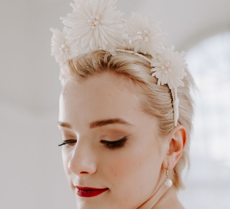 Bridal makeup up with smokey eyes and red lipstick