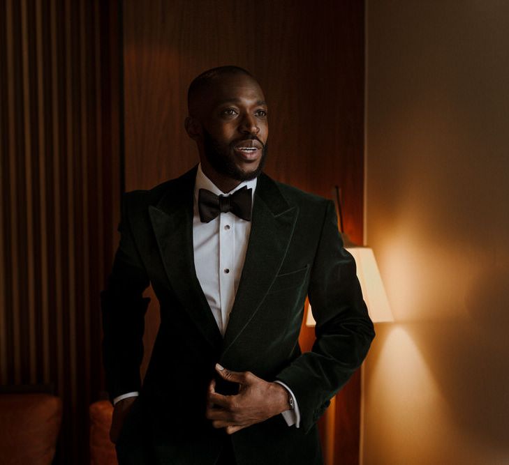 Morning Preparations. Bridal Party. Bride wears dress by Pronovias. Groom wears green velvet blazer from Gieves &amp; Hawkes in this Green And White Luxe, City Wedding. Photography by The Curries.