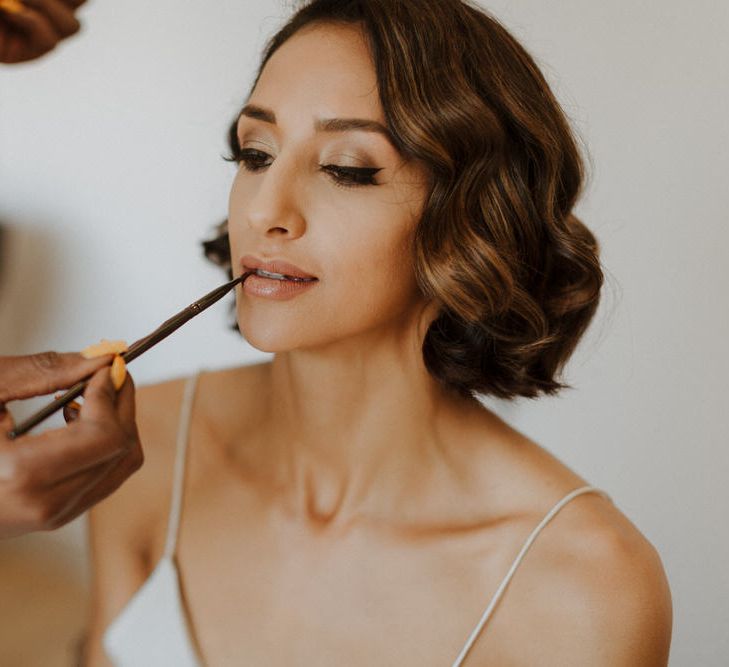 Morning Preparations. Bridal Party. Bride wears dress by Pronovias. Groom wears green velvet blazer from Gieves &amp; Hawkes in this Green And White Luxe, City Wedding. Photography by The Curries.