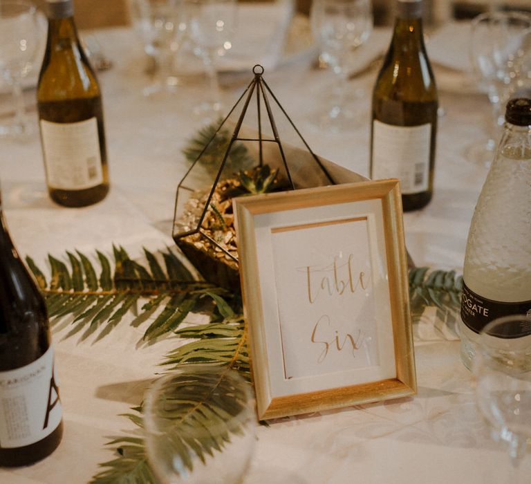 Geometric terrariums and Minimalist decor for this Green And White Luxe, City Wedding. Photography by The Curries.