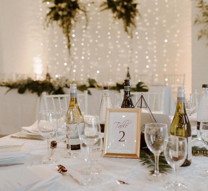 Table decor. Geometric terrariums and Minimalist decor for this Green And White Luxe, City Wedding. Photography by The Curries.