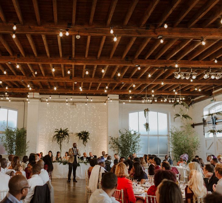 Bride wears dress by Pronovias. Groom wears green velvet blazer from Gieves &amp; Hawkes in this Green And White Luxe, City Wedding. Photography by The Curries.