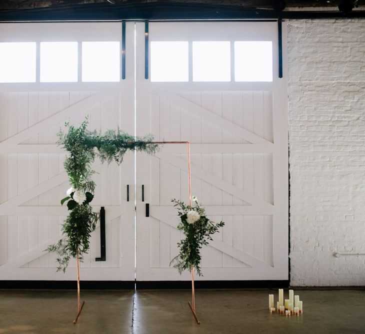 DIY Copper Arbour and Table Plan Stand. Modern Warehouse Wedding in London at Trinity Buoy Wharf. Images by Captured by Katrina Photography