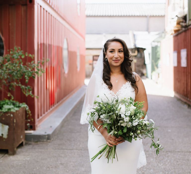 Green Foliage and White Roses. Bride Wears Wed2b Dress. Modern Warehouse Wedding in London at Trinity Buoy Wharf. Images by Captured by Katrina Photography