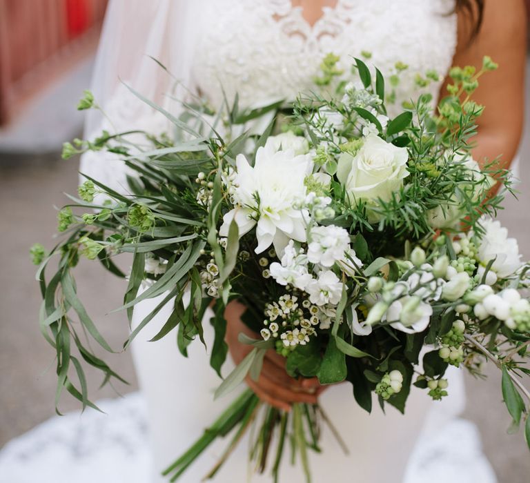 Green Foliage and White Roses. Bride Wears Wed2b Dress. Modern Warehouse Wedding in London at Trinity Buoy Wharf. Images by Captured by Katrina Photography