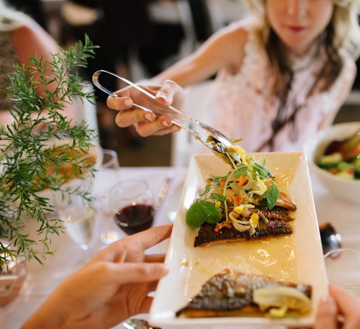 Afro-Caribbean Food on Sharing Plates. Modern Warehouse Wedding in London at Trinity Buoy Wharf. Images by Captured by Katrina Photography