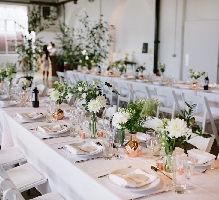 Green Foliage with White Roses and Copper Accents. Modern Warehouse Wedding in London at Trinity Buoy Wharf. Images by Captured by Katrina Photography