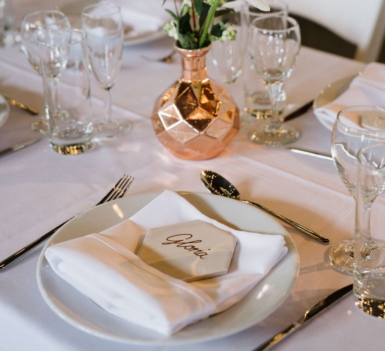 Green Foliage with White Roses and Copper Accents. Modern Warehouse Wedding in London at Trinity Buoy Wharf. Images by Captured by Katrina Photography