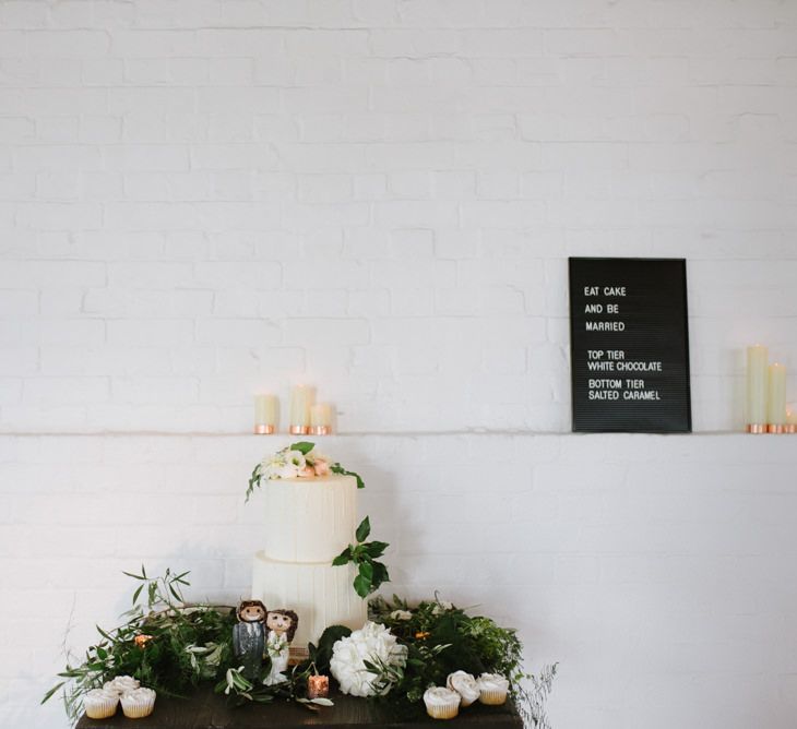 Simple Salted Caramel and White Chocolate Wedding Cake. Green Foliage with White Roses and Copper Accents. Modern Warehouse Wedding in London at Trinity Buoy Wharf. Images by Captured by Katrina Photography