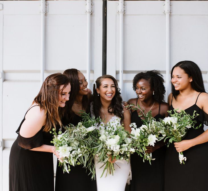 Monochrome Bridal Party Fashion. Bridesmaids in Boohoo Black Dresses. Modern Warehouse Wedding in London at Trinity Buoy Wharf. Images by Captured by Katrina Photography