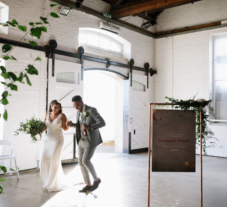 DIY Copper Arbour and Table Plan Stand. Modern Warehouse Wedding in London at Trinity Buoy Wharf. Images by Captured by Katrina Photography